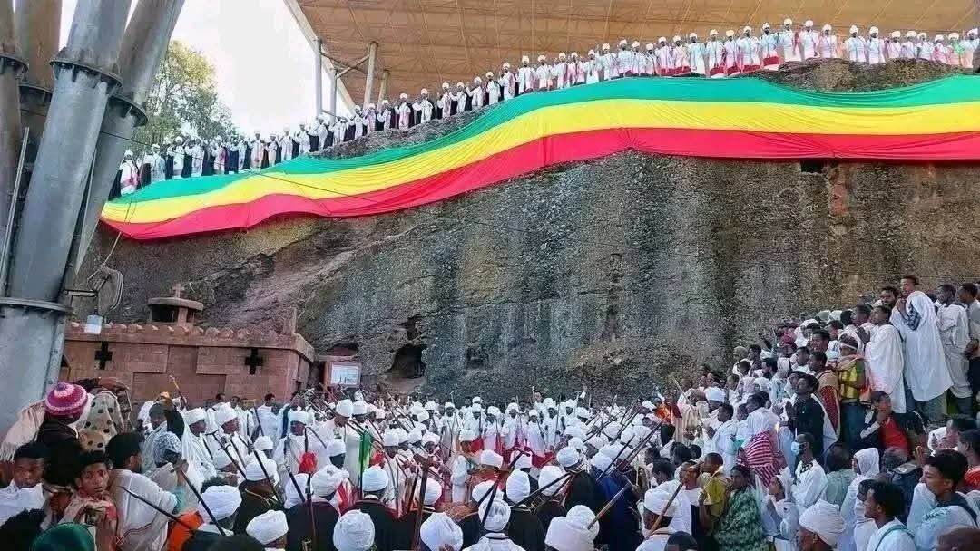 Genna celebration with worshippers in white attending church