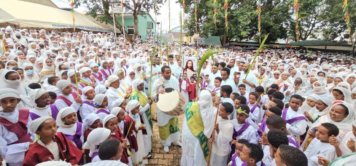 Ethiopian Orthodox faithful celebrating Hosaena with palm fronds