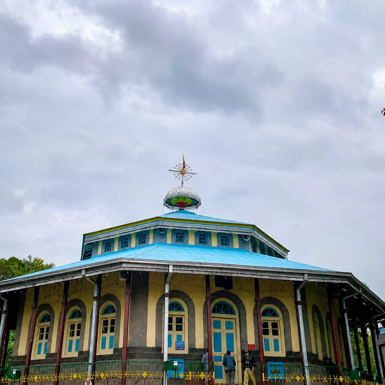 Ethiopian Orthodox church with blue roof and cross — place of worship for Lideta