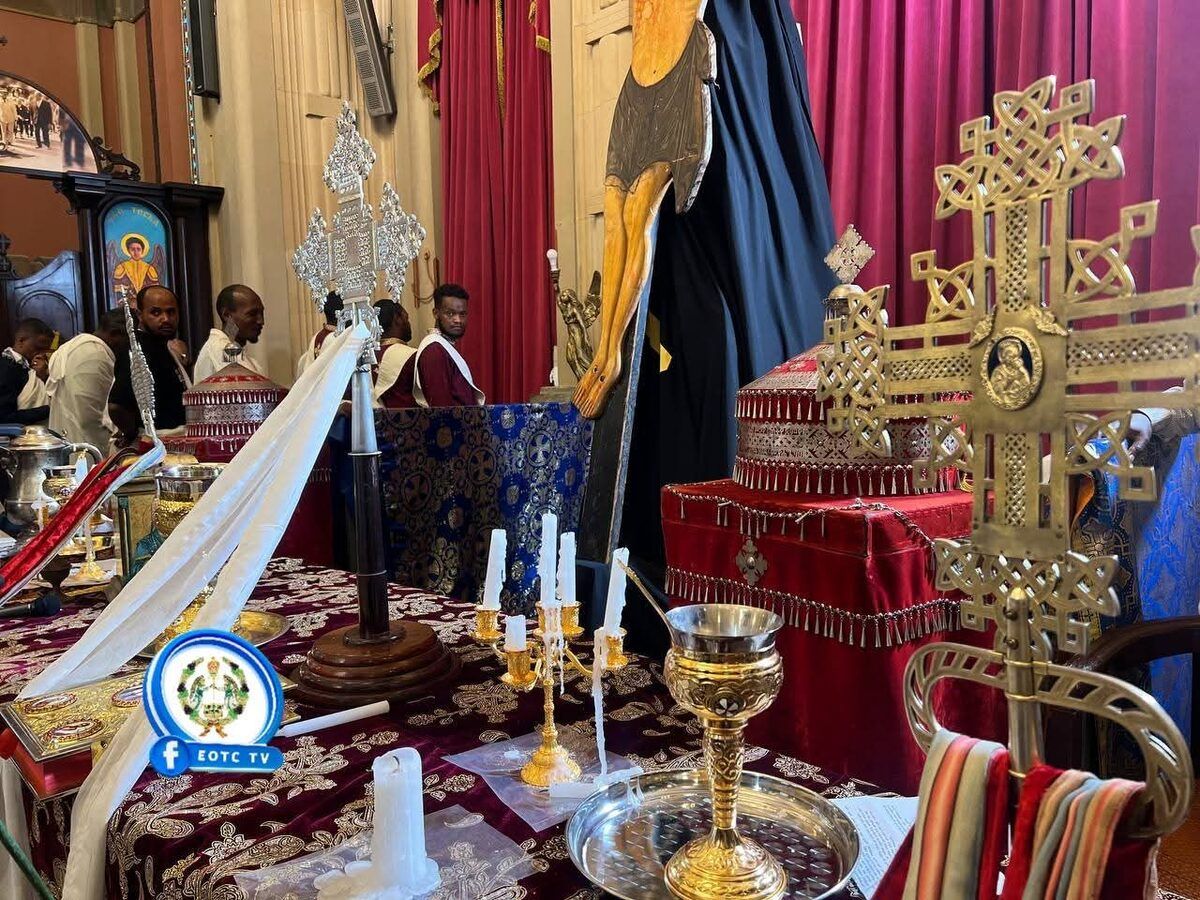 Church altar with Ethiopian Orthodox crosses draped in black for Siklet