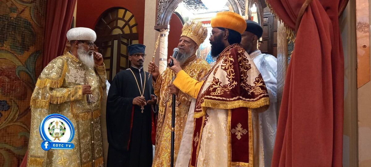 Ethiopian Orthodox clergy in ceremonial vestments during Siklet Good Friday